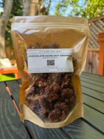 Chocolate Hazelnut Granola pouch from Citrine Delight – front of packaging on rustic background