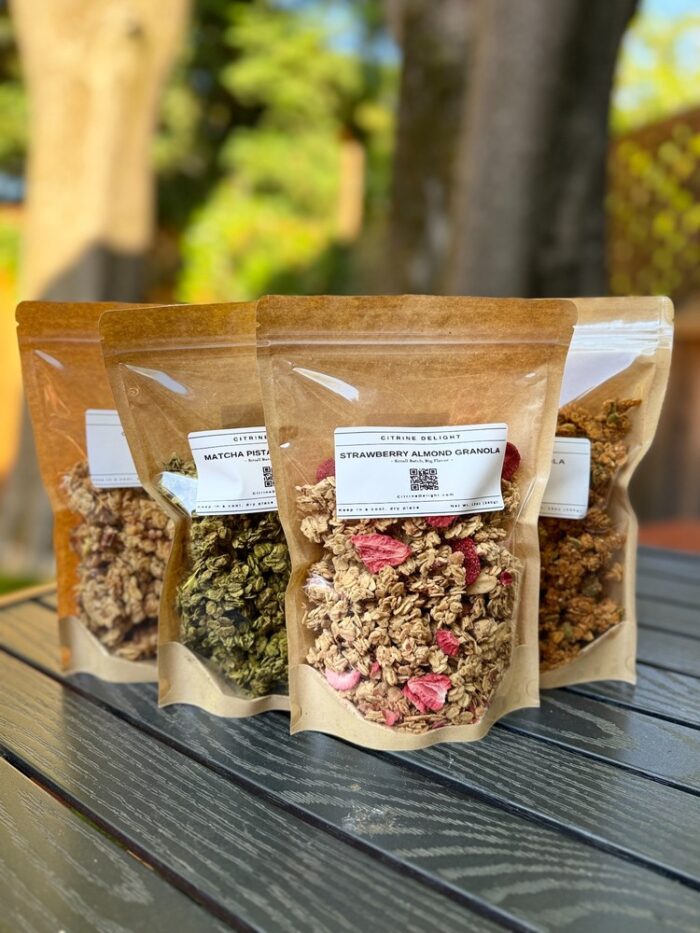Citrine Delight Mix and Match Box – four granola pouches in assorted flavors including Strawberry Almond, Coconut, Matcha Pistachio, Pecan Berry, and Chocolate Hazelnut