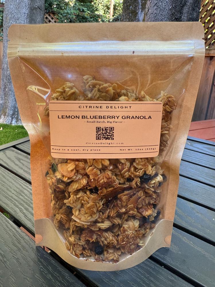 Lemon Blueberry Granola with oats, almonds, coconut flakes, and blueberries.