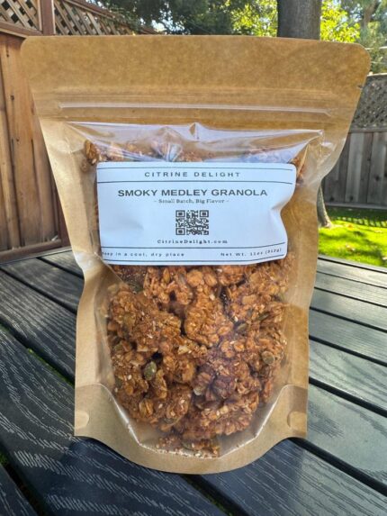 Smoky Medley Granola pouch from Citrine Delight – front of packaging on rustic background